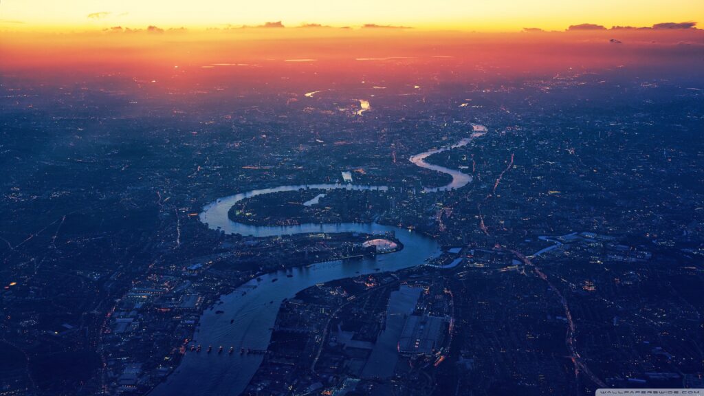 winding_river_sunset_city_aerial_view-wallpaper-2560x1440